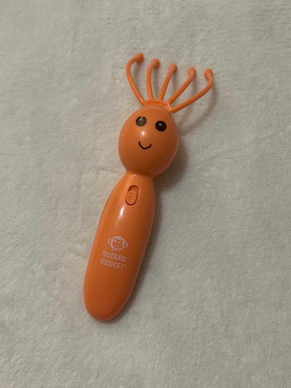 Orange Modern Monkey Scalp Massager